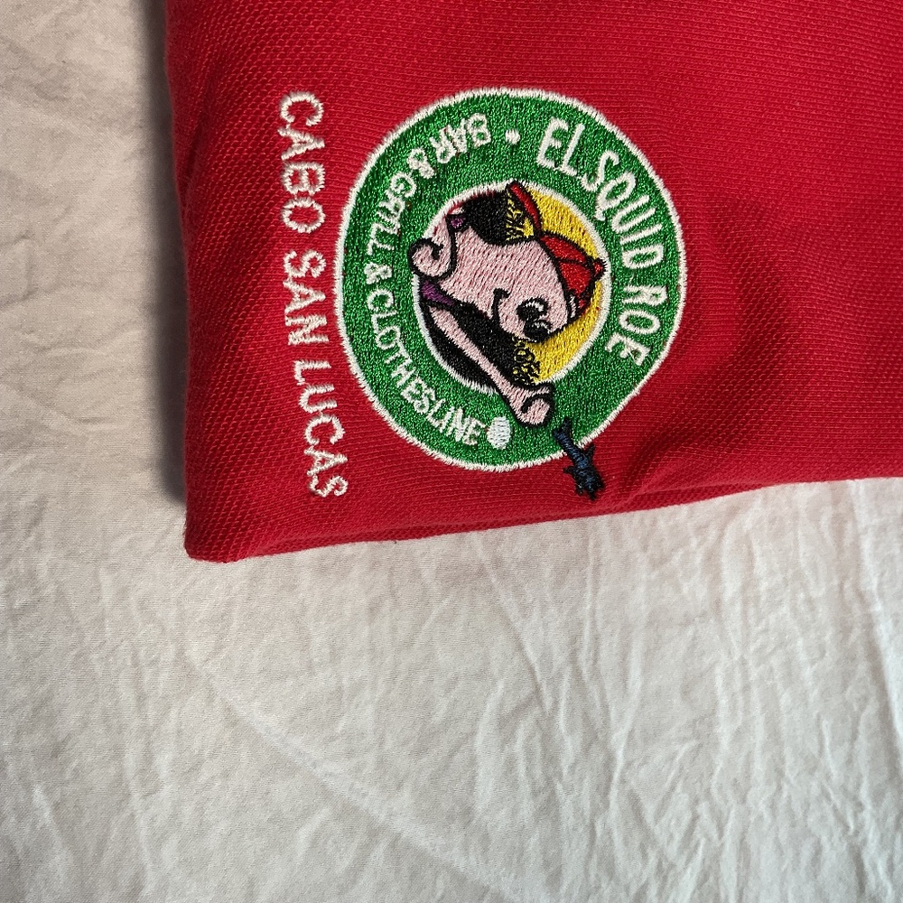 Red polo shirt from Cabo San Lucas, El Squid Roe Bar & Grill & Clothesline